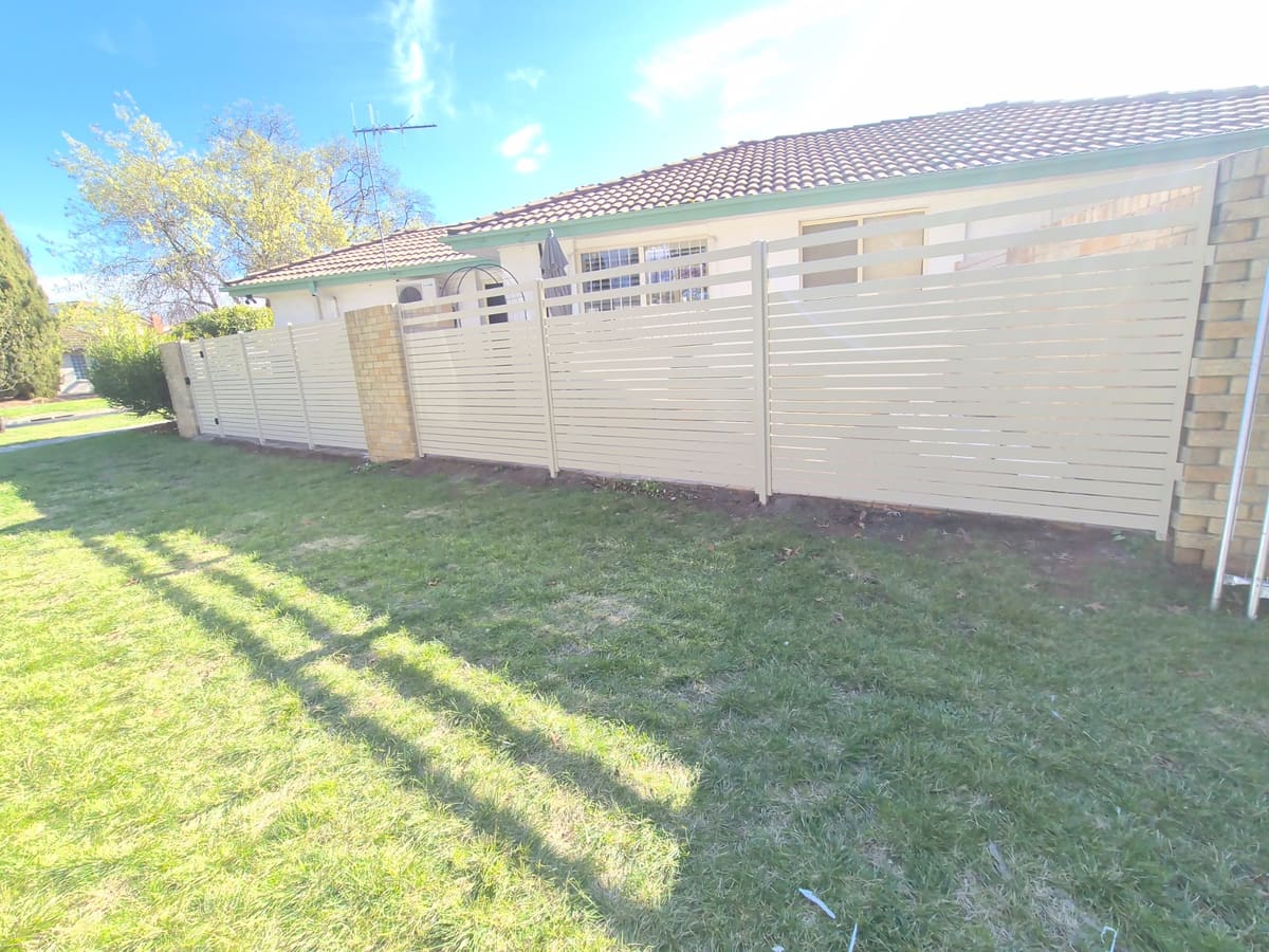 Timber fence replaced after